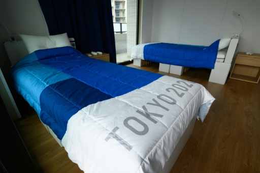 Daily tests, cardboard beds: 24 hours at Tokyo's Olympic Village