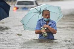 Severe rainstorms kill 12 in flooded China subway.jpg