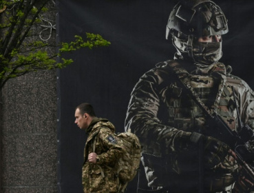 Ukraine pushes military-aged men to return home.jpg