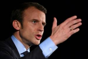 France's Macron unveils priorities as race tightens.jpg