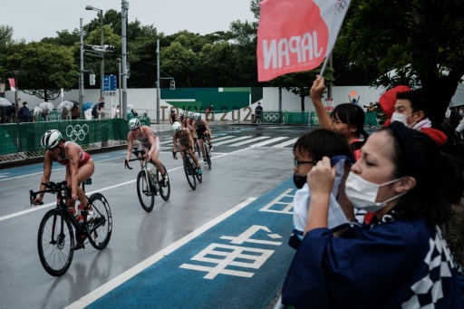 'Can't help but cheer': Some in Japan warm to Olympics