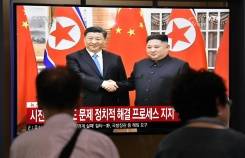 Leaders of China and North Korea vow to strengthen ties.jpg