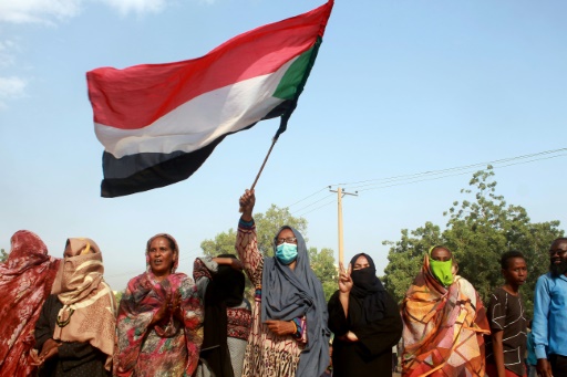 Sudanese protest into night after general ousts government