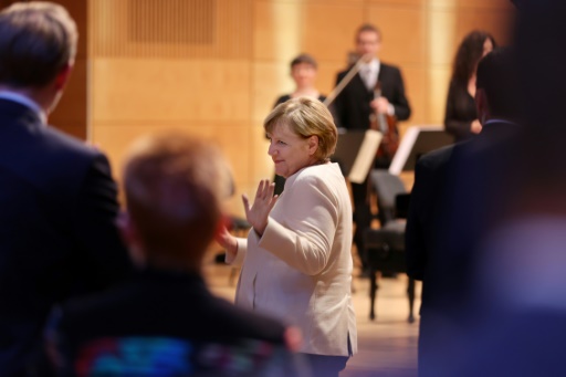 Merkel urges compromise at start of tough coalition talks