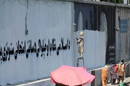 Afghan art activist defiant as Taliban erase Kabul murals.jpg