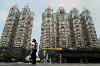 Evergrande agrees deal to avoid default on key bond.jpg