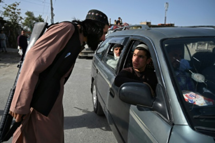 Taliban police learn the ropes.jpg