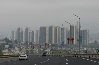 China to expand property tax trial to check speculation.jpg