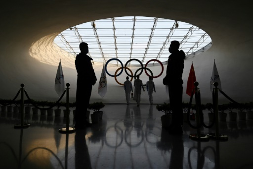 Police escorts, hazmat suits - welcome to Beijing's Olympic bubble