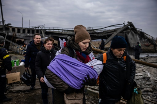 Russia to open Ukraine 'humanitarian routes', but fears persist