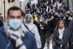 France eases Covid curbs, including outdoor mask-wearing