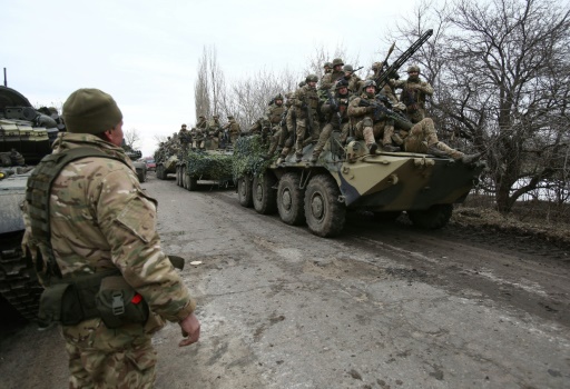 Invading Russian forces press deep into Ukraine