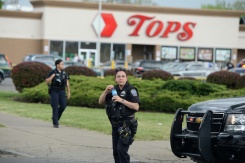 US mourn victims of racist mass shooting at store