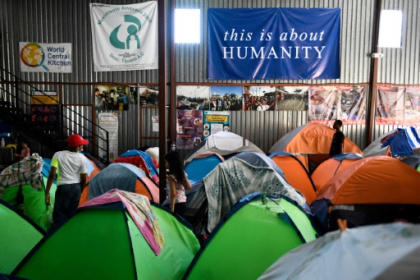 Latinos stuck at Mexico border as Ukrainians enter US.jpg