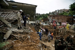 Death toll mounts from Brazil downpours as search continues