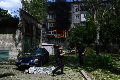 Russian fire pounds Ukraine, as Putin announces.jpg