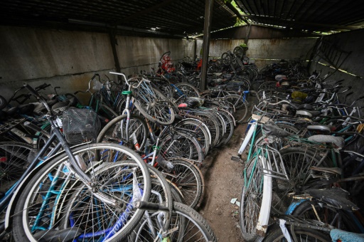 In Ukraine's south, bicycles wait for their owners' return