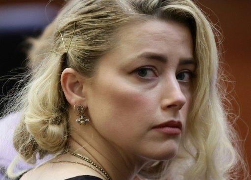 Amber Heard agrees to pay Johnny Depp $1m in defamation case