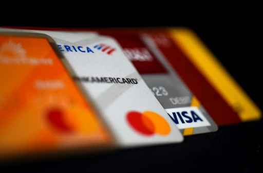 Italy partly bows to EU over card payments