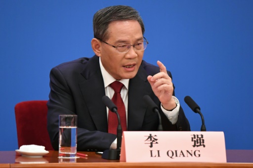 China premier warns 2023 growth target 'no easy task'.