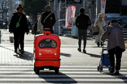 Japan rolls out 'humble and lovable' delivery robots.jpg