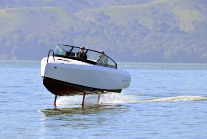 Electric boat goes airborne for cleaner ocean voyage.jpg