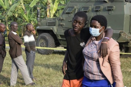 Fear, grief after 41 dead in 'brutal' Uganda school attack.jpg