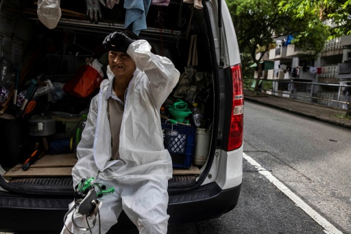 'In a sauna': Hong Kong's labourers swelter as temperatures rise