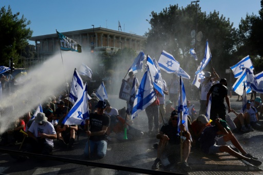 Israel PM defends 'necessary' judicial reform vote as protests flare