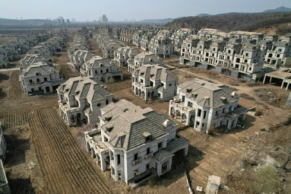 Chinese ghost town of mansions reclaimed by farmers.jpg Chinese ghost town of mansions reclaimed by farmers.jpg