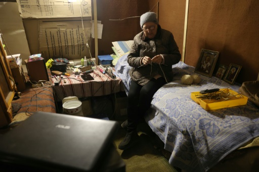 'Cosy' cell: Ukraine frontline pensioners' second winter underground