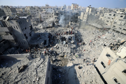 Israel says troops encircle Gaza City.jpg