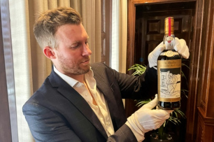 Record for world's priciest bottle of whisky smashed at London auction.jpg