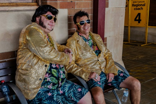 Sideburns, sweat and blue suede shoes on Australia's Elvis train