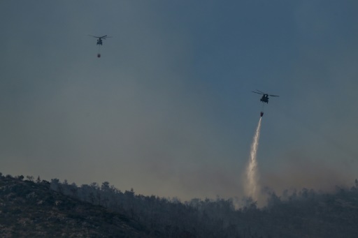 Greece fighting dozens of wildfires braces for worse to come