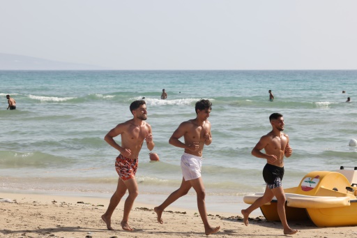 In shadow of war, Lebanese find respite on southern beach