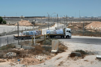 Commercial goods trucked into Gaza after aid logjams.jpg