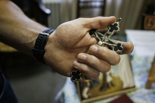 Belgian exorcist offers 'healing' -- and combats cliches