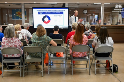 Arizona voters air fraud concerns at fortified election center