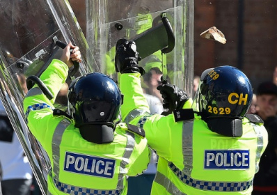 UK grapples with worst riots in 13 years.jpg