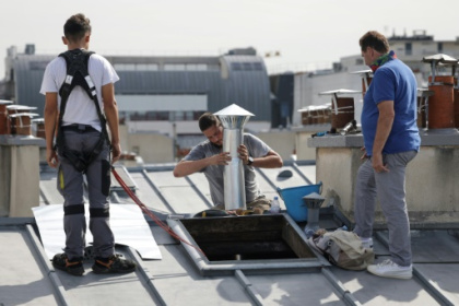 Paris zinc roofers seek elusive UNESCO heritage status.jpg