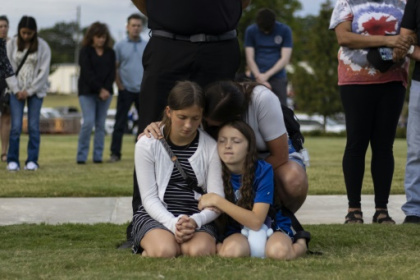 Father charged along with son, 14, in US school shooting.jpg