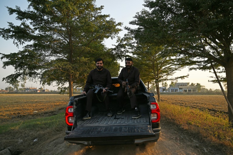 Imposing pickup trucks symbolise Pakistan's power gulf