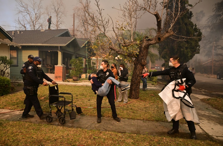 Los Angeles fires rage on as National Guard called in