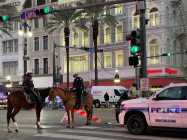 Police cordon off the intersection of Canal Street and Bourbon Street in the French Quarter of New Orleans, Louisiana after a driver rammed a truck into a crowd