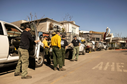 Private firefighters stand watch at property opwned by billionaire developer Rick Caruso