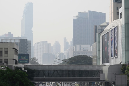 Air pollution in the Thai capital forced the closure of more than 350 schools Friday -- around a hundred more than the previous day