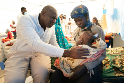 British Foreign Secretary David Lammy meets an acutely malnourished infant at a clinic for Sudanese refugees in neighbouring Chad.