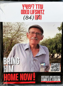 A poster of Oded Lifshitz, 83 at the time of his capture by Palestinian militants who were to release his body along with those of three other Israelis