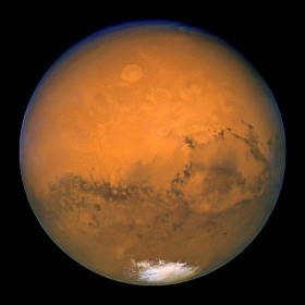 A file photo taken 27 August 2003 by NASA's Hubble Space Telescope shows Mars snapped within minutes of the planet's closest approach to Earth in nearly 60,000 years